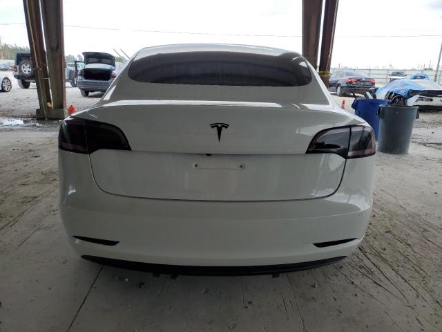 37304284-2020-tesla-model-3_6