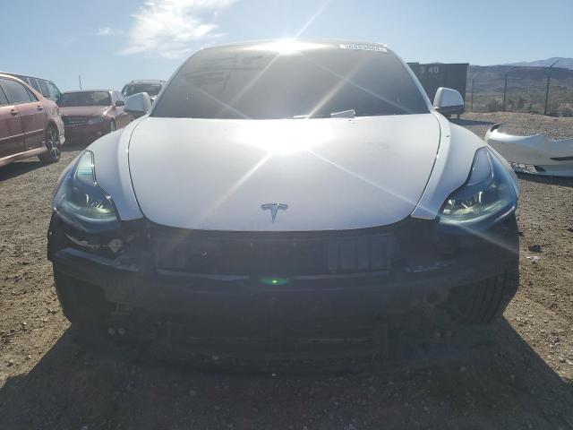 56889684-2023-tesla-model-3_5