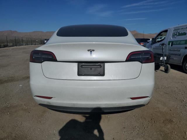 56889684-2023-tesla-model-3_6