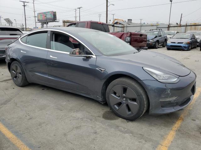 58078884-2019-tesla-model-3_4