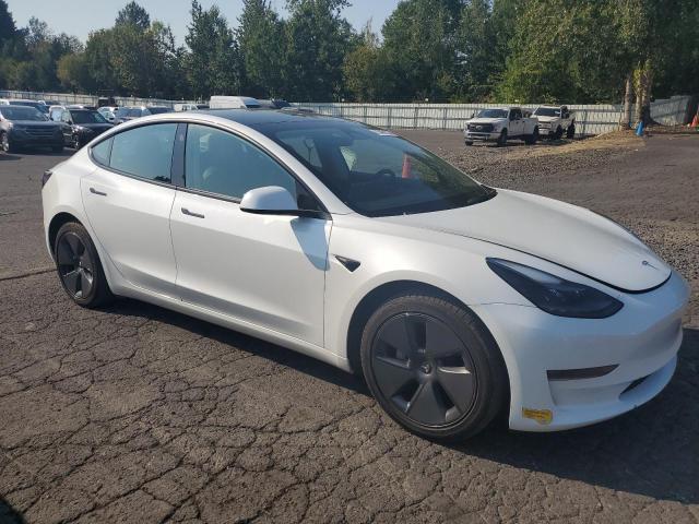 70461524-2023-tesla-model-3_4