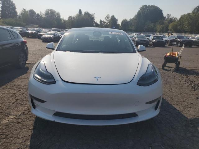 70461524-2023-tesla-model-3_5