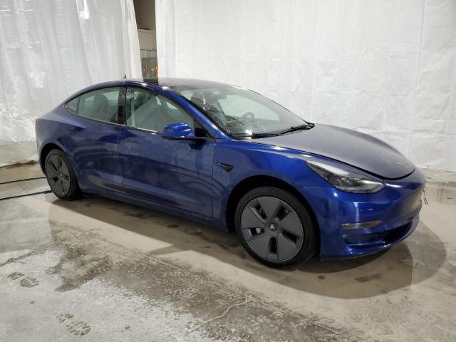 71895564-2022-tesla-model-3_4