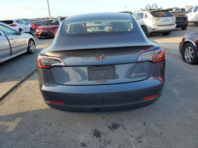 74257484-2023-tesla-model-3_6