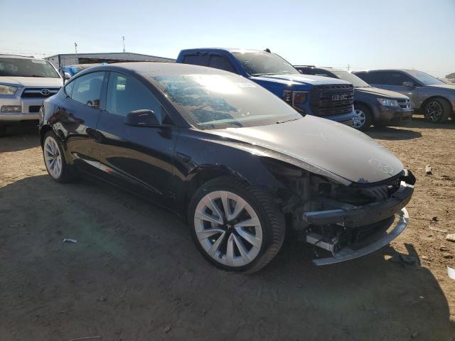 75276674-2021-tesla-model-3_4