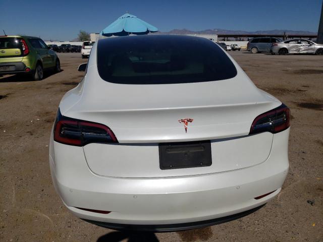 75532013-2021-tesla-model-3_6