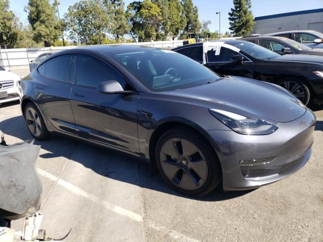 76005853-2022-tesla-model-3_4