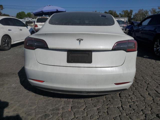 77902864-2023-tesla-model-3_6