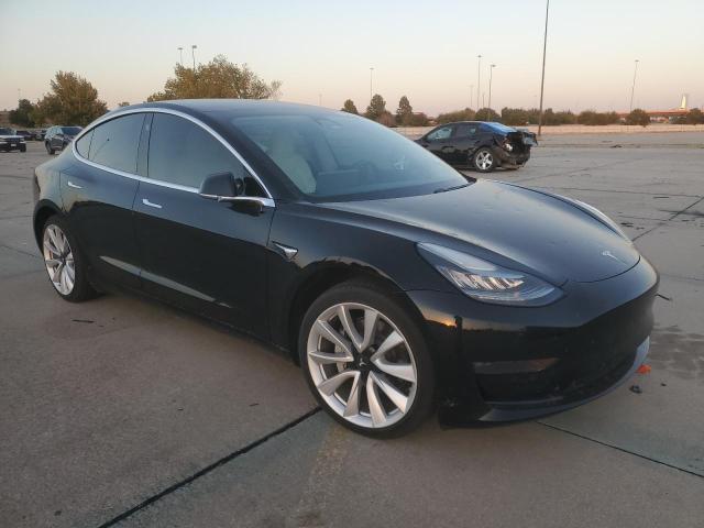 77986724-2019-tesla-model-3_4