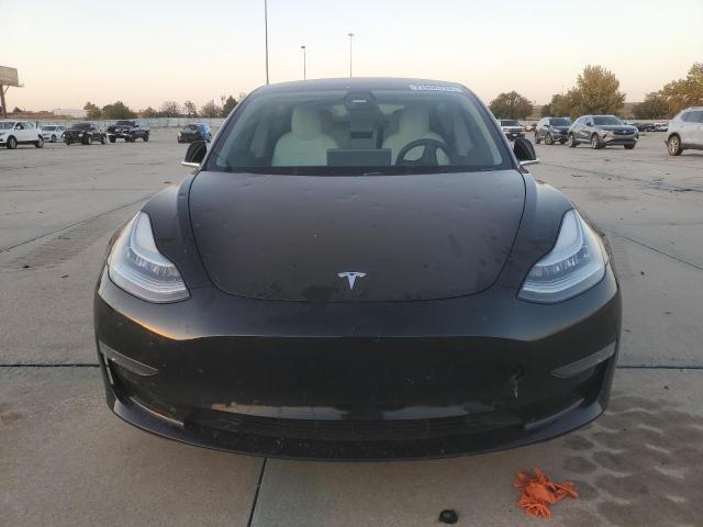 77986724-2019-tesla-model-3_5