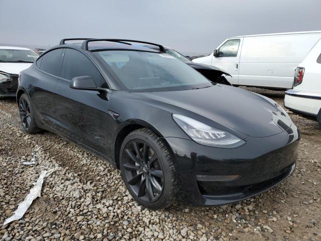 78177773-2018-tesla-model-3_4