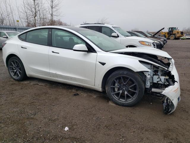 78508563-2022-tesla-model-3_4