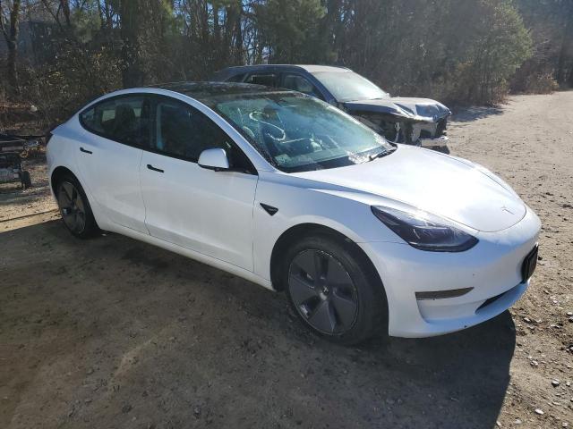 80654934-2023-tesla-model-3_4