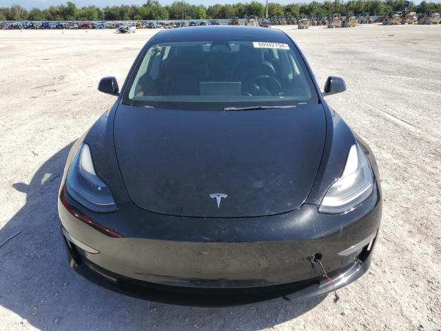 80942794-2021-tesla-model-3_5