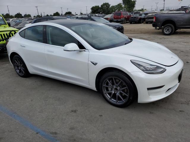 81091174-2020-tesla-model-3_4