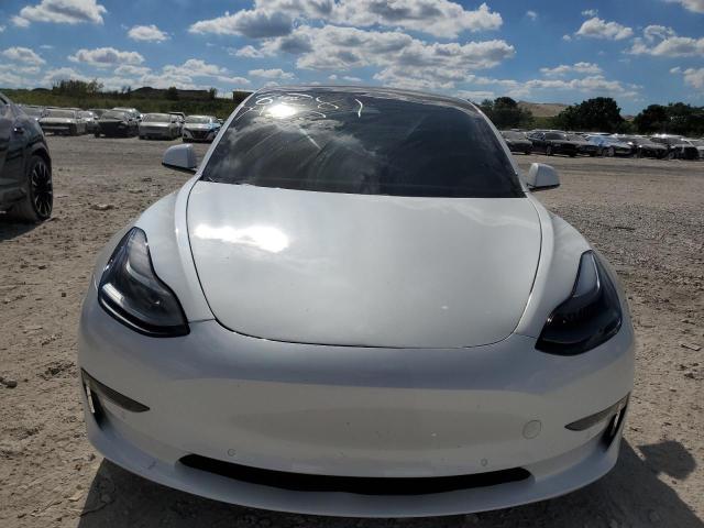 82817484-2021-tesla-model-3_5