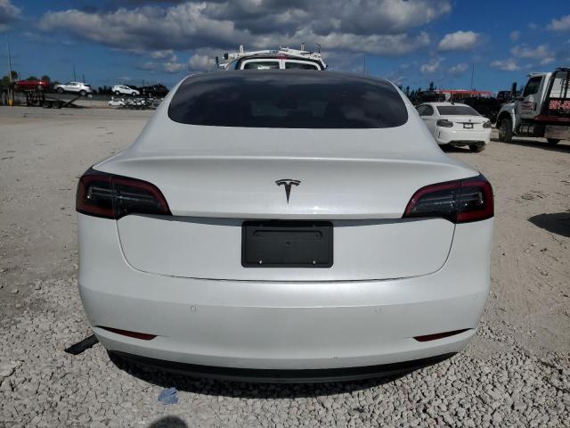 82817484-2021-tesla-model-3_6