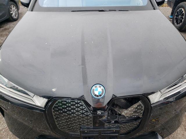 83069974-2024-bmw-ix-xdrive5_12