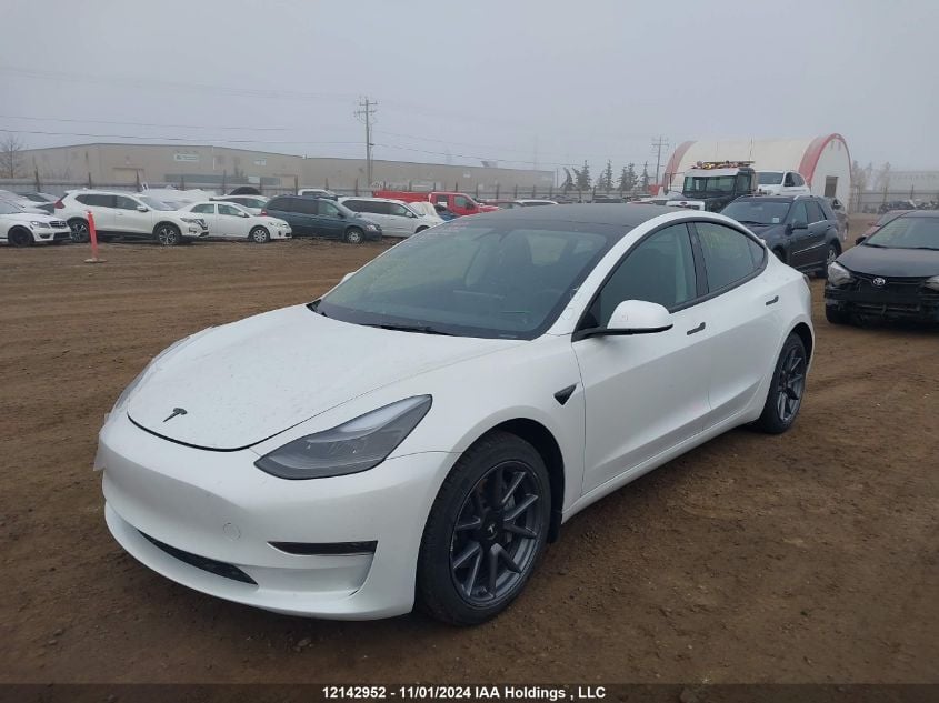 i2497806-2023-tesla-model-3_2