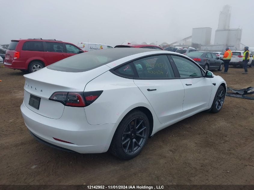 i2497806-2023-tesla-model-3_4